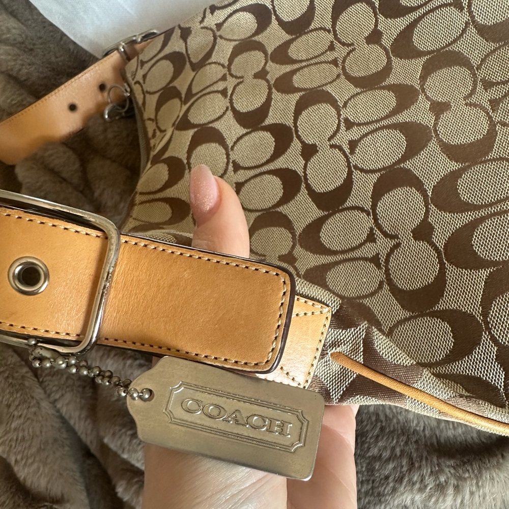 Coach Signature Swingpack
Crossbody Bag Style 6347 - Picture 9 of 14